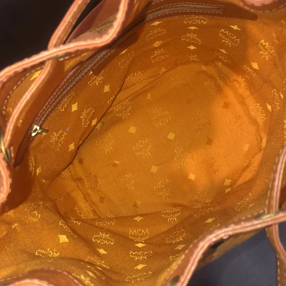 MCM Visetos Cognac Leather Monogram Bucket Drawstring Crossbody Bag EUC